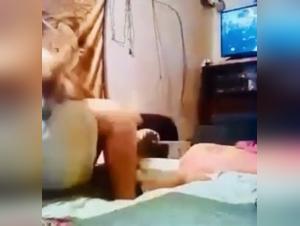 Dog and woman in a bestial sex scene