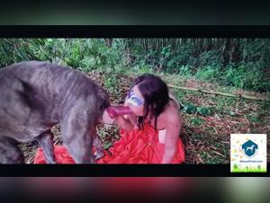 A woman and her dog in a beastly video