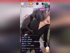Asian woman and her dog: a video of extreme zoophilia