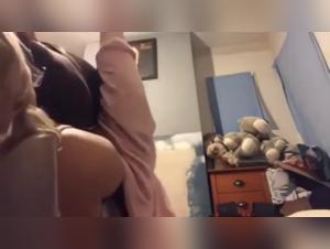 Woman and dog in a missionary position