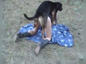 German biker and her dog in a bestiality video