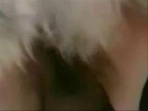 A mistress and her dog in a beastly video