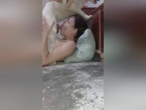 Intimate Moment: A Woman and Her Canine Best Friend
