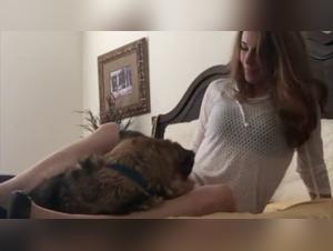 Bestiality Video - A mature woman fucks her dog