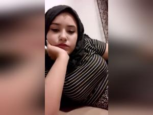 Turkish woman in hijab and dog in shocking bestiality video