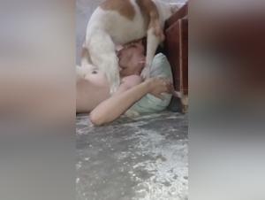 Shocking bestiality with a young woman and her dog