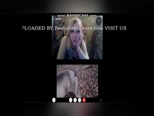 Woman watching sex videos with dogs