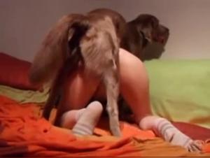 Woman subjected to a Fire Dog