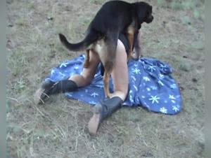 Woman on a motorcycle and dog: a beastly sex video