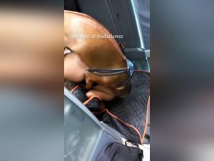 Kissing Her Dog in the Car