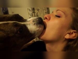 Woman and dog: a beastly love story