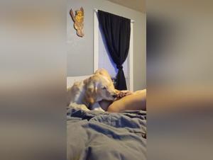 woman with piercings and dog