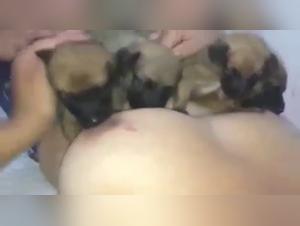 Breastfeeding prohibited: a woman and her dog