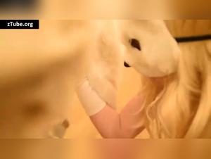 A unique bestial experience: Submissive woman and her canine master