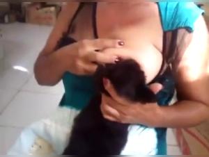 Woman and puppy: a shocking scene of zoophilia