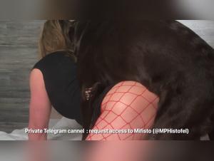 Veronica's Intimate Moment with a Canine Companion