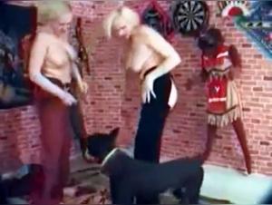 Bestiality: Blonde, well-endowed women with a Labrador