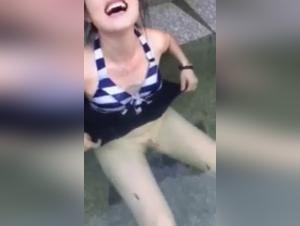 Asian Girl's Intimate Moment with Her Canine Friend