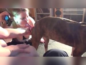 Round and amateur woman in a zoophilia video