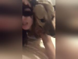 Bestiality video: a woman and her dog