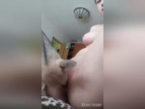 Bestiality: A woman and her dog