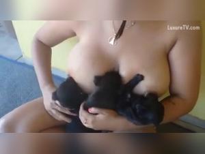 Bestiality sex video: a woman and a dog in a hard scene