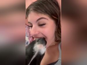 TikTok, she's riding a shovel with her dog