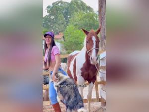 Woman dancing with her horse in explicit video