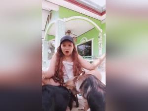 Asian Girl Pushed to the Limits with Two Dogs