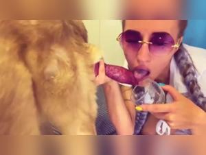A couple fucks with their dog