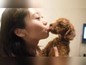 Passionate Encounter: Woman and Dog